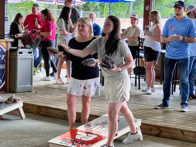 DNOW Charity Cornhole Tournament in Tomball, TX, supports RedM's mission in the fight against sex trafficking. #CharityEvent #CommunitySupport