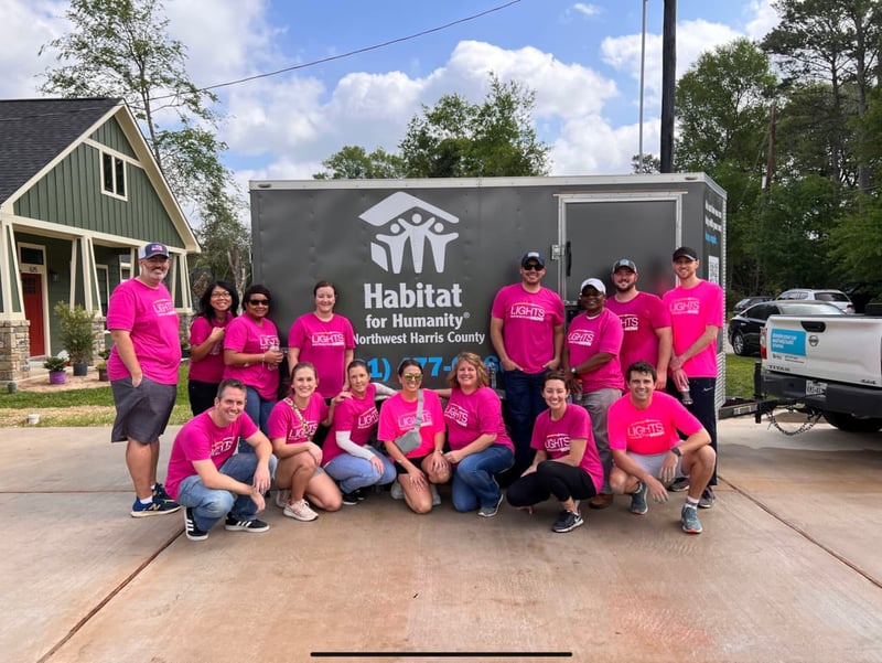 Photo of DNOW Lights volunteers that had the opportunity to volunteer with Habitat for Humanity Northwest Harris County.