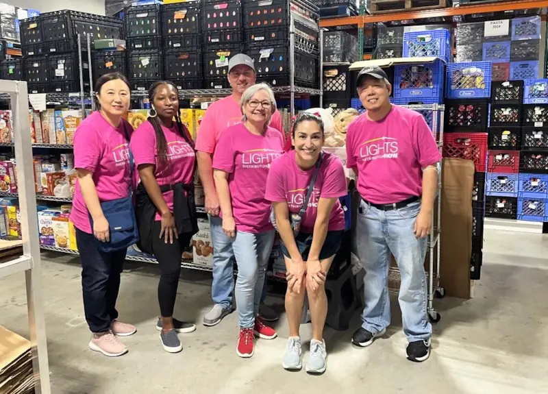Lending a hand: Volunteers sort food to support the Cypress Assistance Ministries' mission to aid those in financial crisis in Houston.