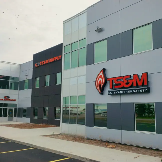 TS&M Supply Estevan Fire and Safety, featuring fire and safety logo on side of the building.